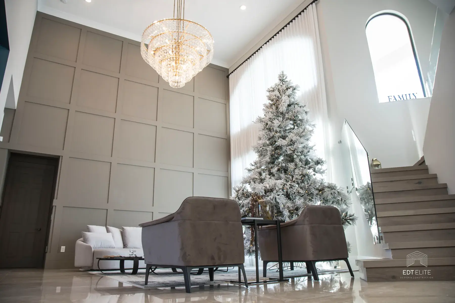 Living salon in the Star Island residence with layered neutral seating and natural light